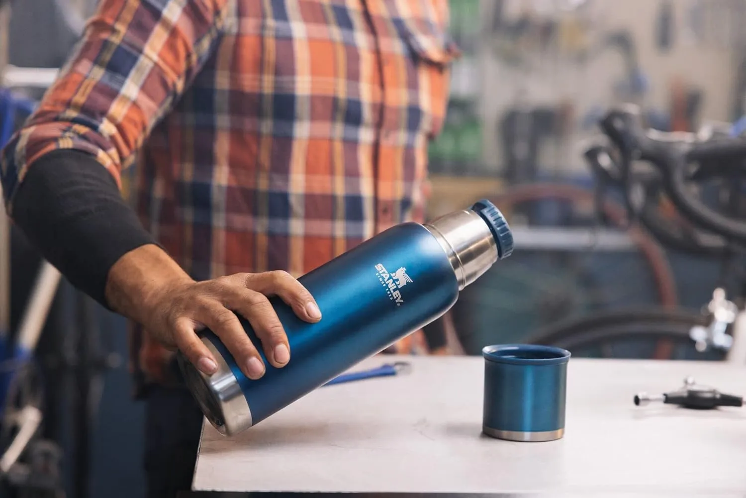 Stanley Adventure-To-Go Vacuum Bottle 1.1 qt | Wide Mouth with Leakproof Cup Lid | Keep Drinks Hot or Cold | Packable for Travel | Insulated Stainless Steel Thermos | BPA-Free | Blue Glow